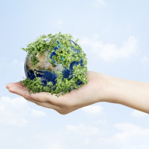 Sustainable living environmentalist hand holding green earth